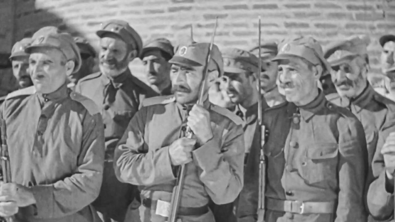 Mountainous March 1939 movie scene