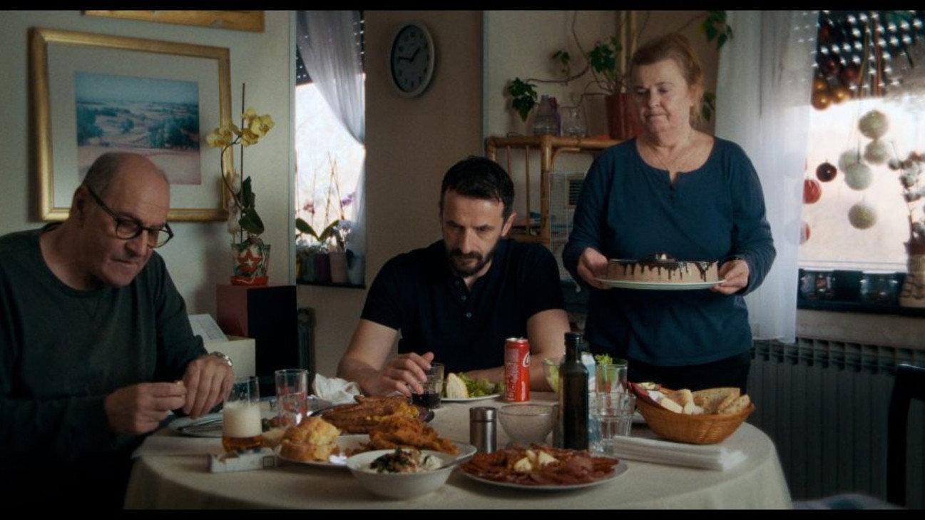 At the table 2024 movie scene