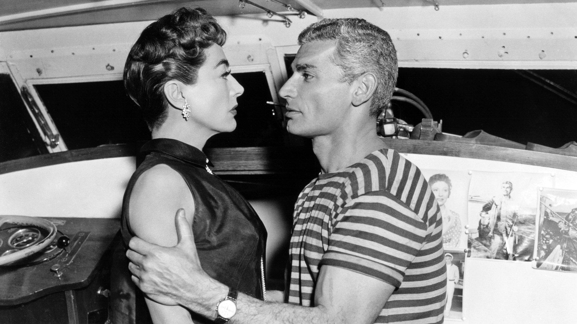 Female on the Beach 1955 movie scene