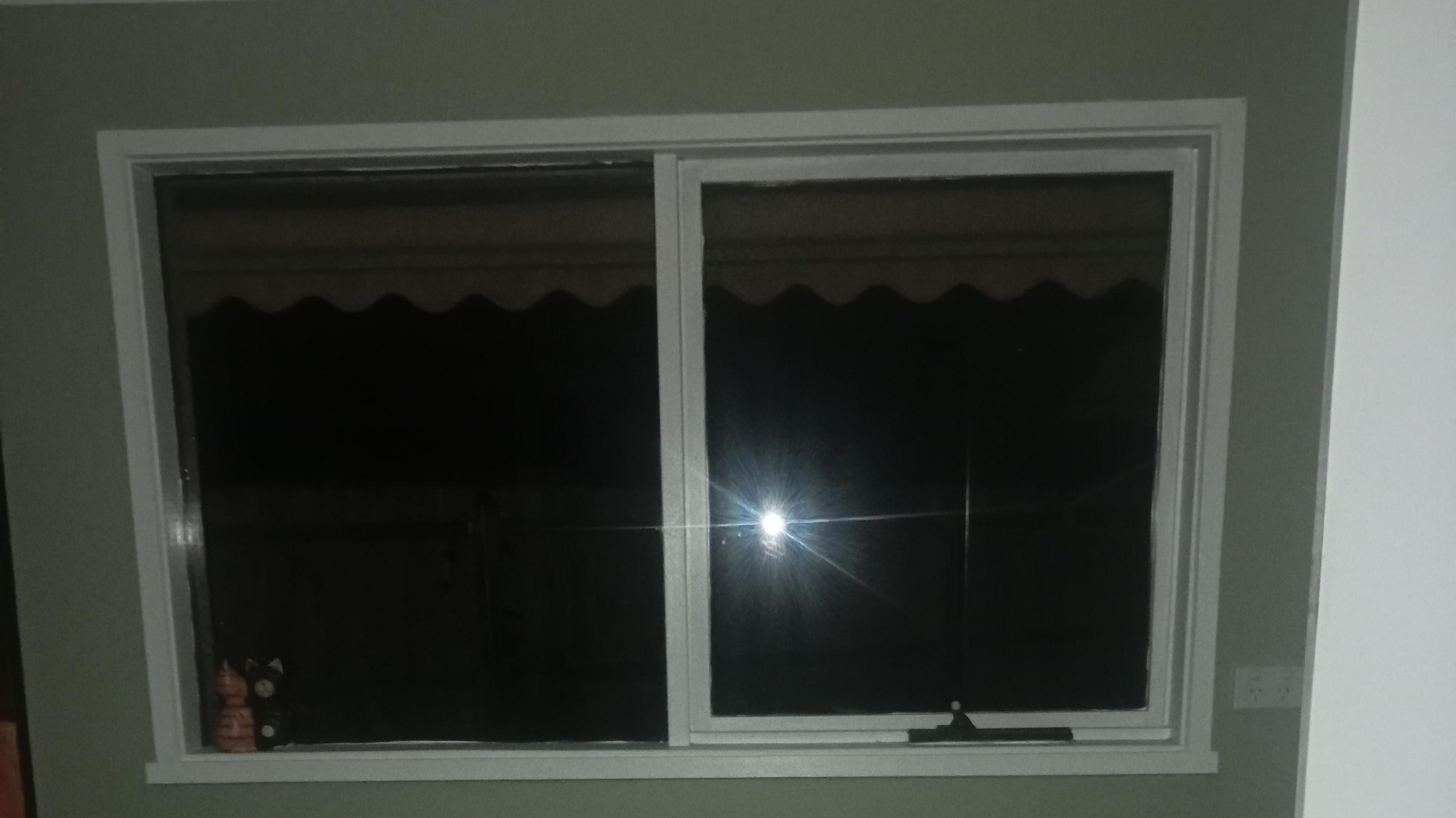 The man in the window 2024 movie scene