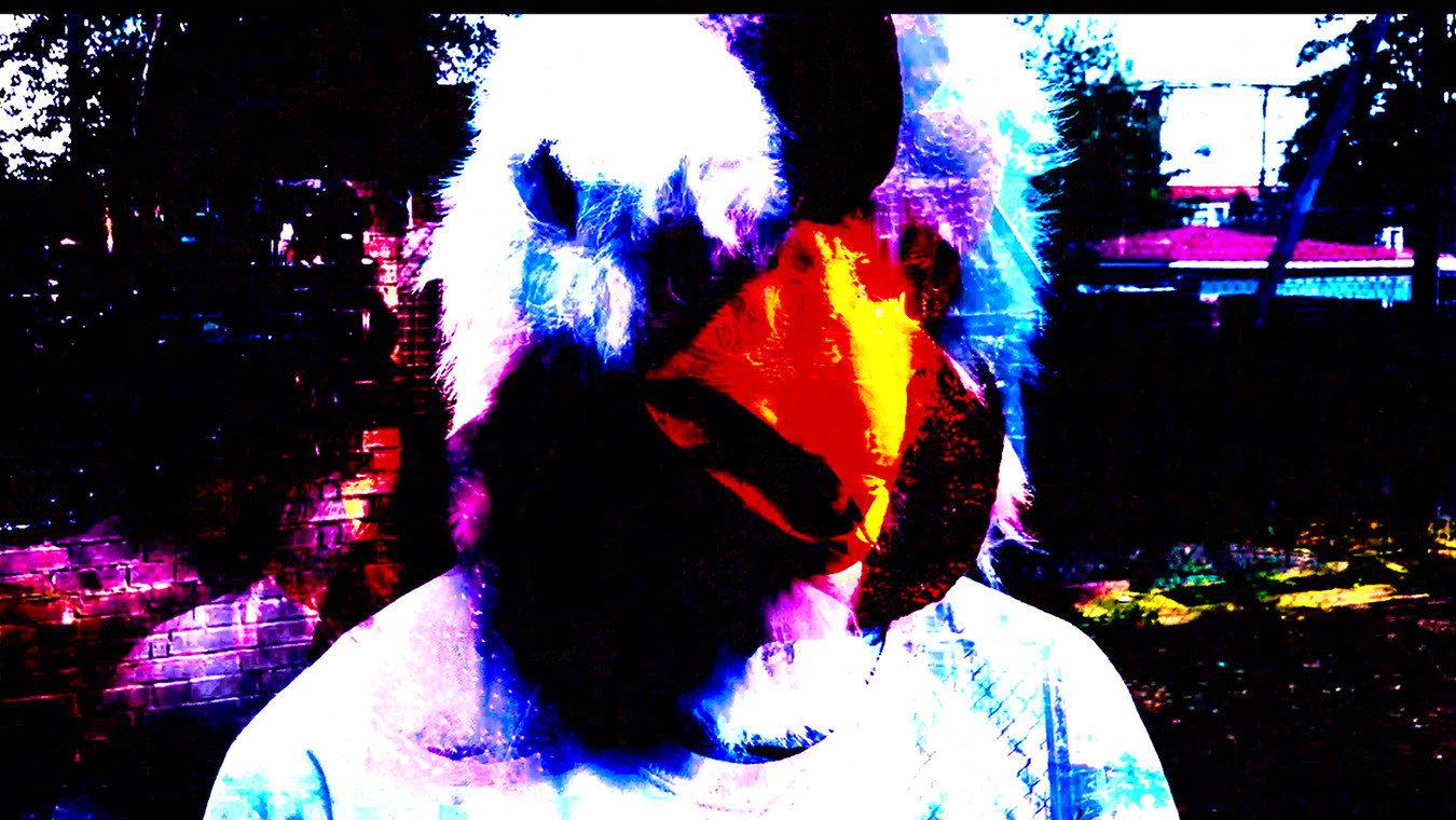 Why he got a chicken on his head? 2023 movie scene