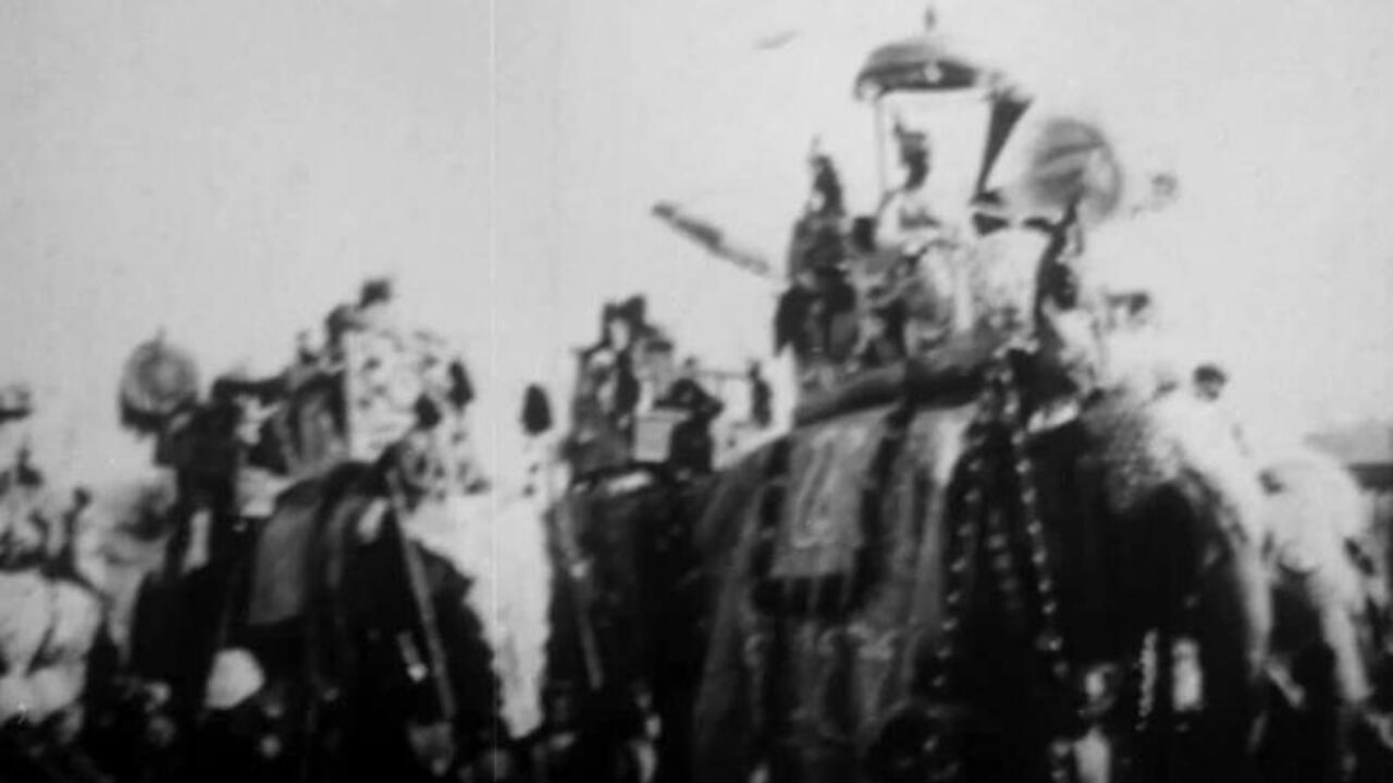 Procession of Elephants with Howdahs - India 1905 movie scene