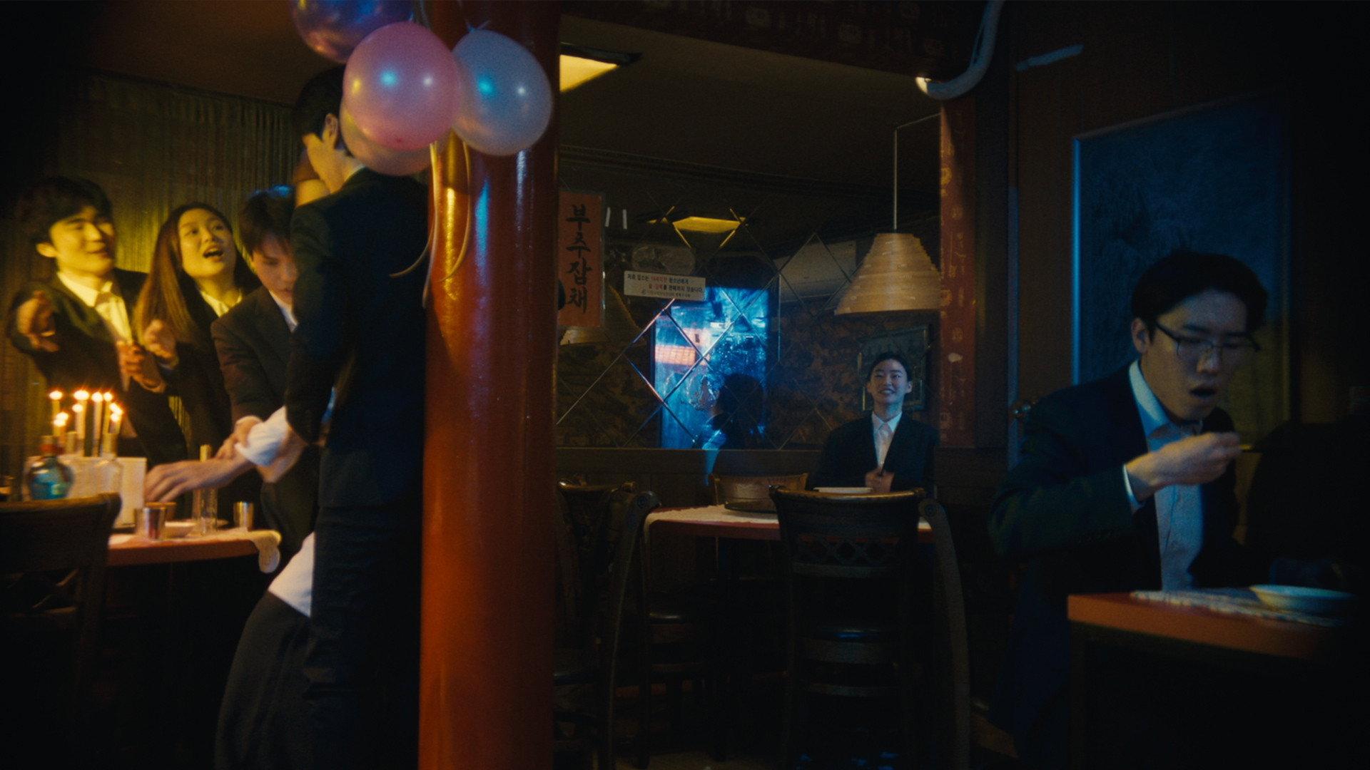 I’d like that corner seat over there 2025 movie scene