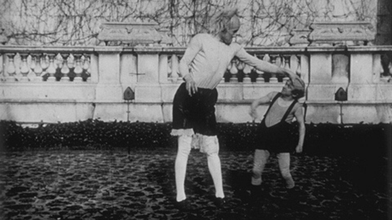 Giant and Dwarf 1896 movie scene