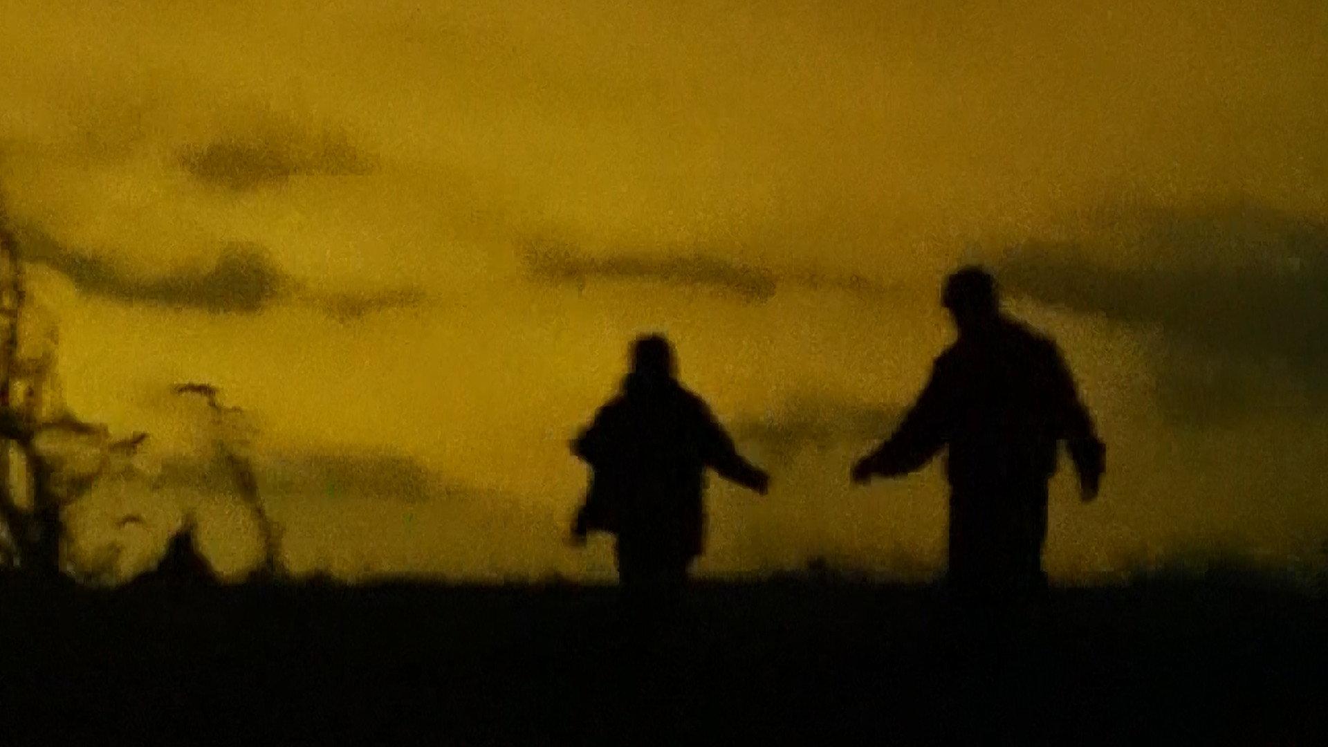 Figures Around a Fire 2025 movie scene