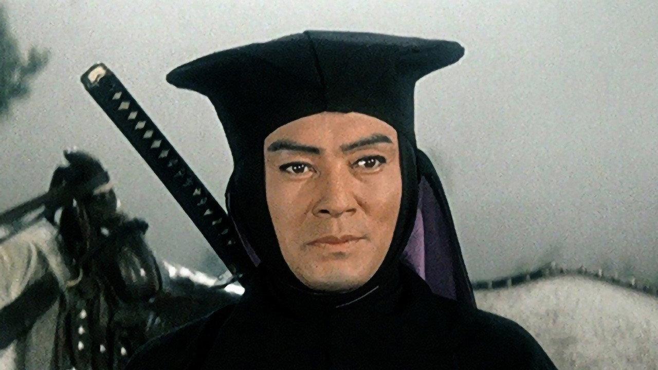 The Black Hooded Man in Peril 1960 movie scene