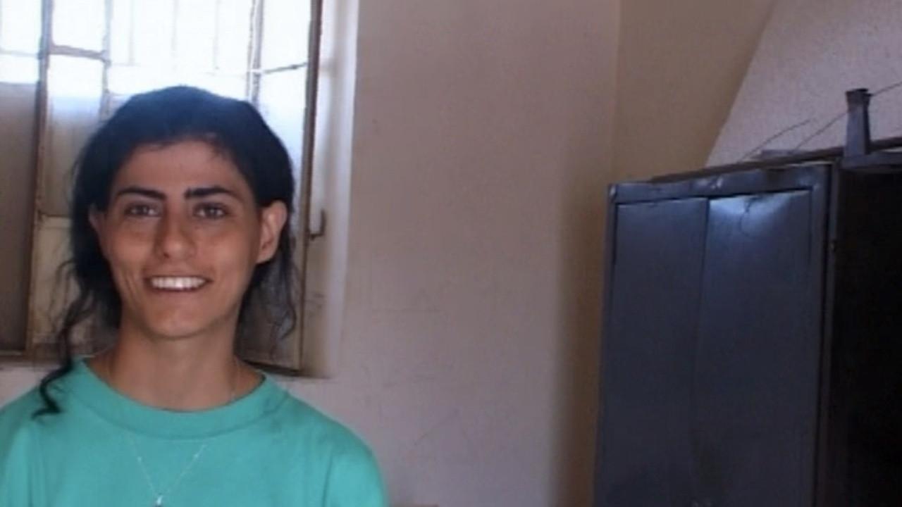 Souha, Surviving Hell 2001 movie scene