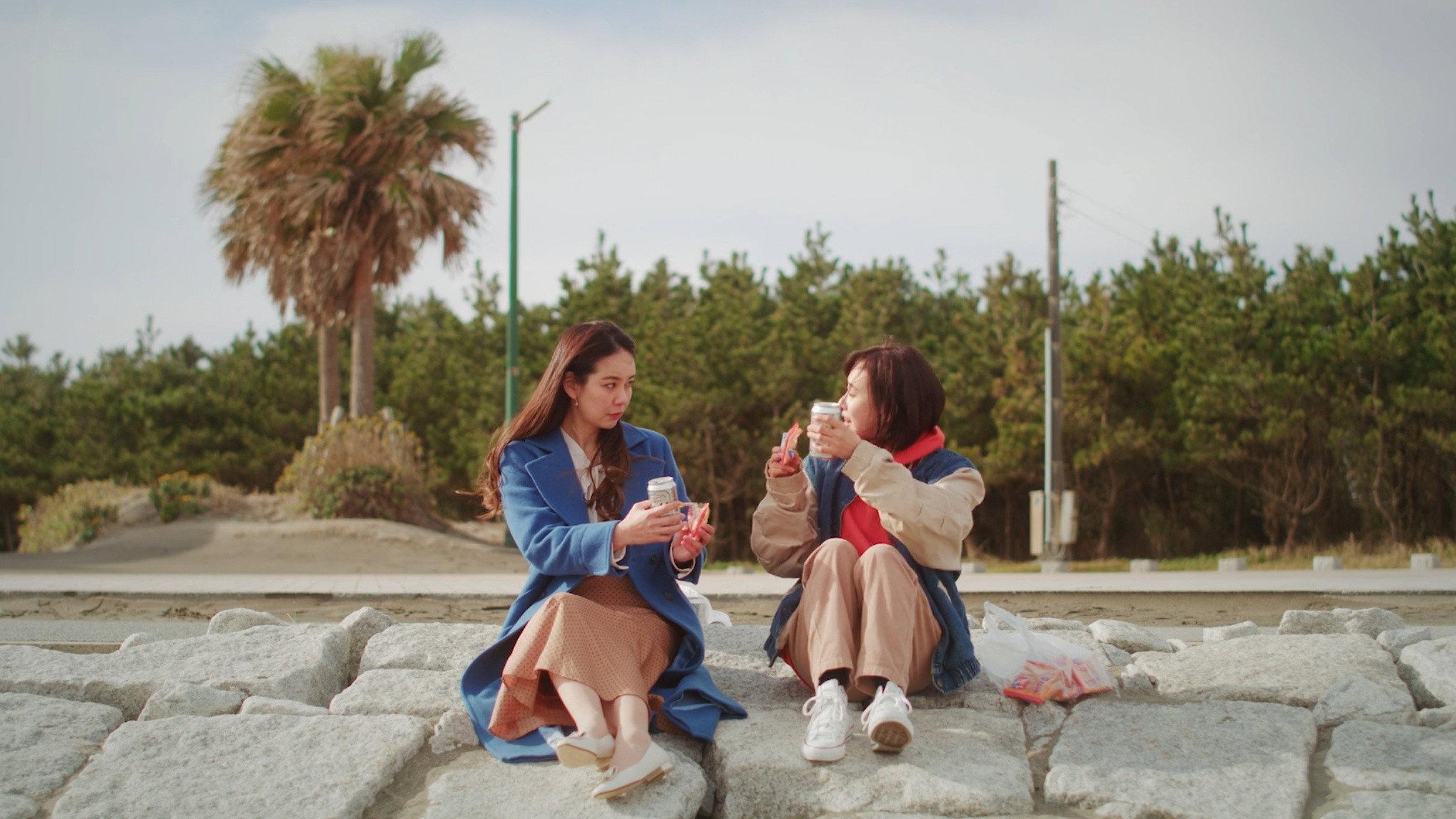 Flowers Blooming on the Shore 2022 movie scene