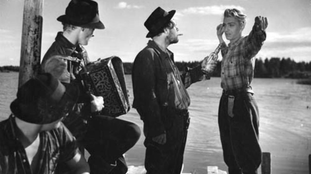 People in the Summer Night 1948 movie scene