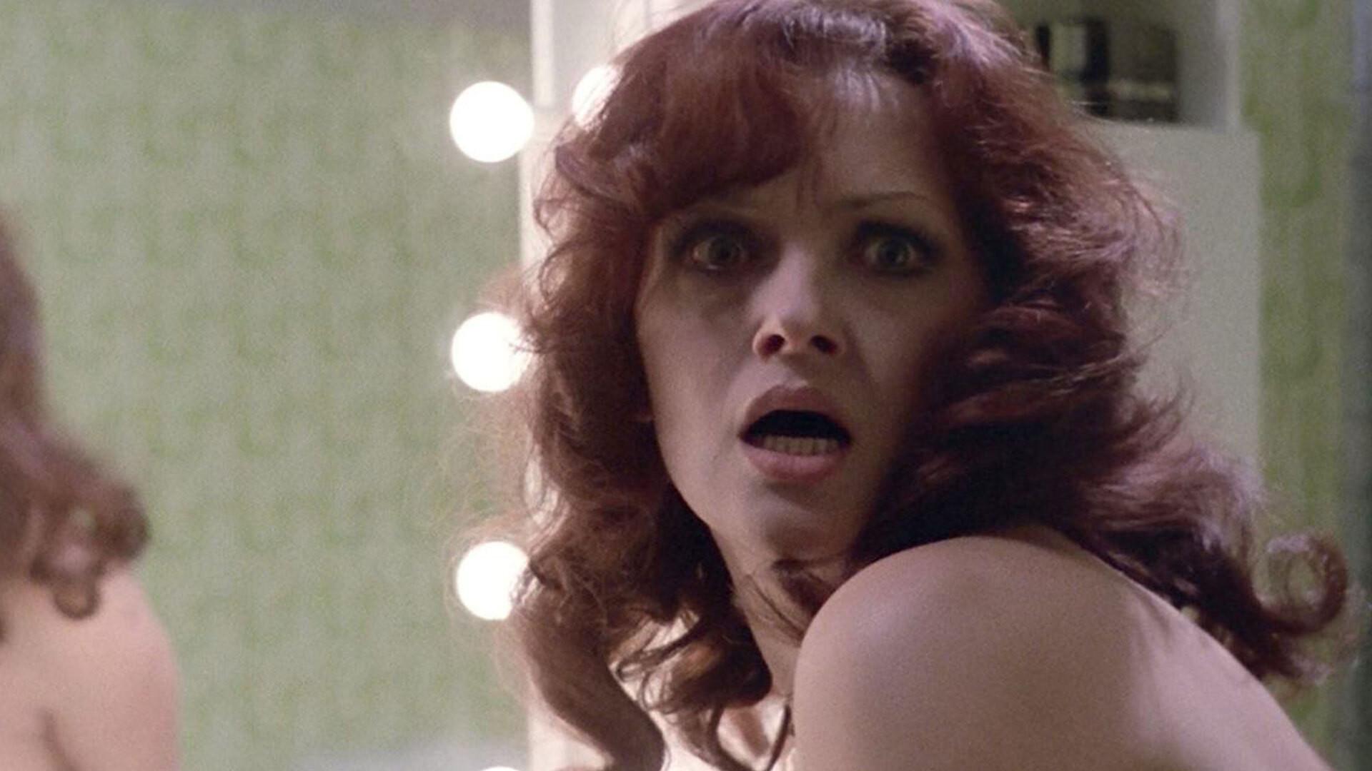 Strip Nude for Your Killer 1975 movie scene