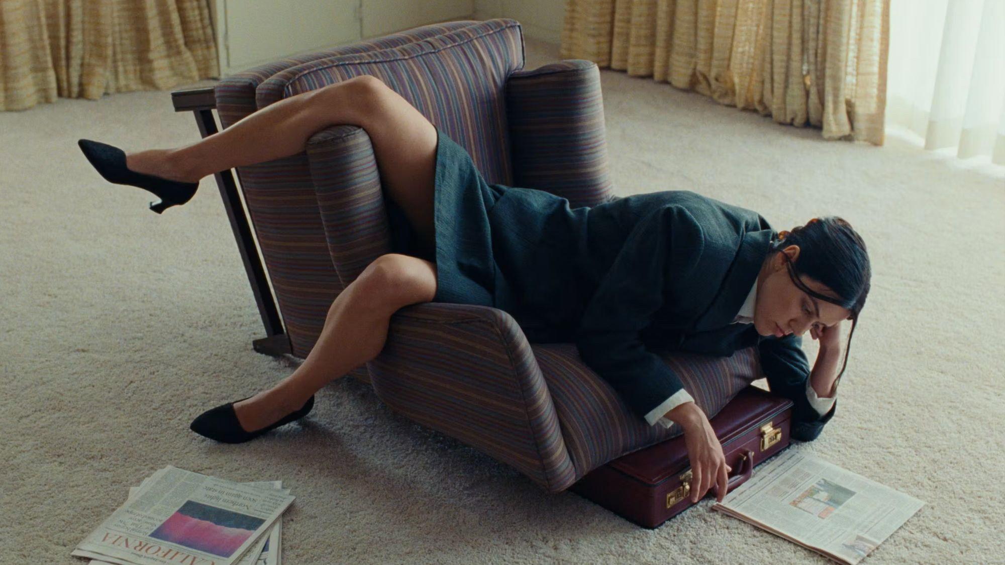 Seeking Comfort In An Uncomfortable Chair 2023 movie scene