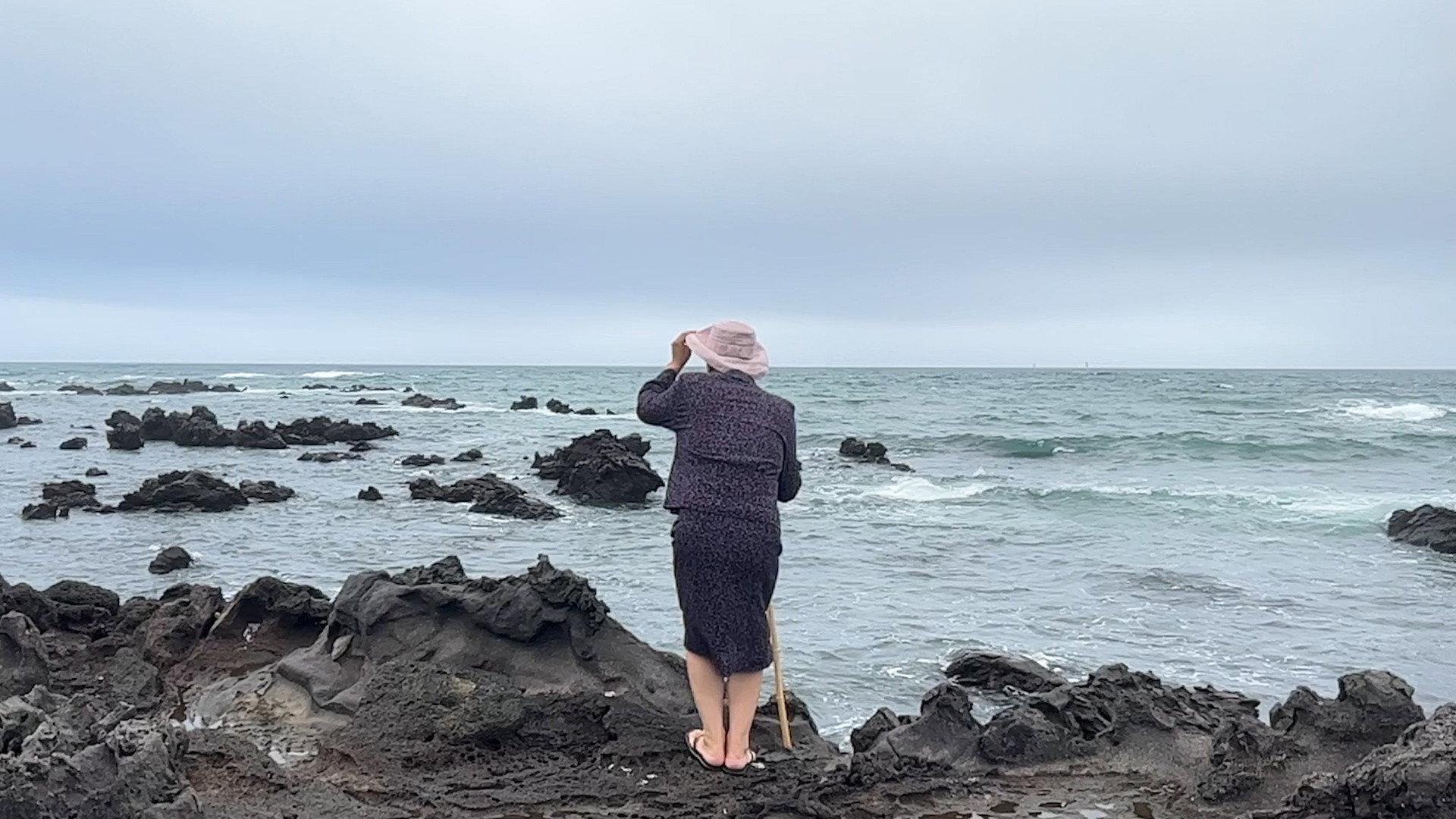 Memories Showers Seas 2025 movie scene