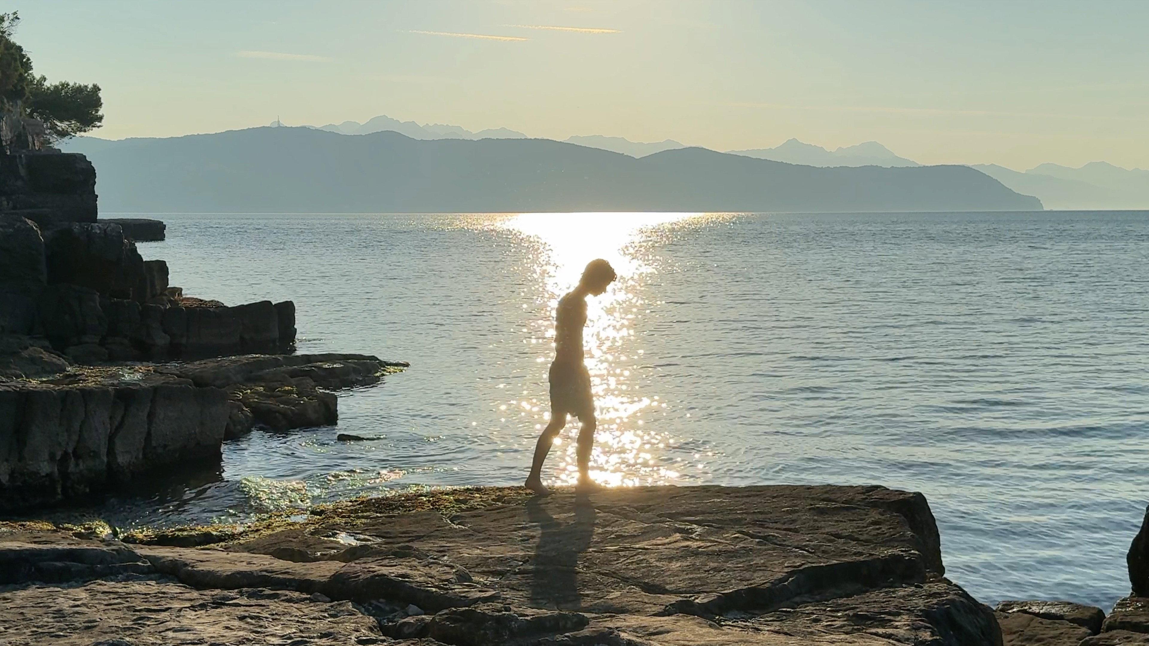 Summer on a solitary beach 2024 movie scene