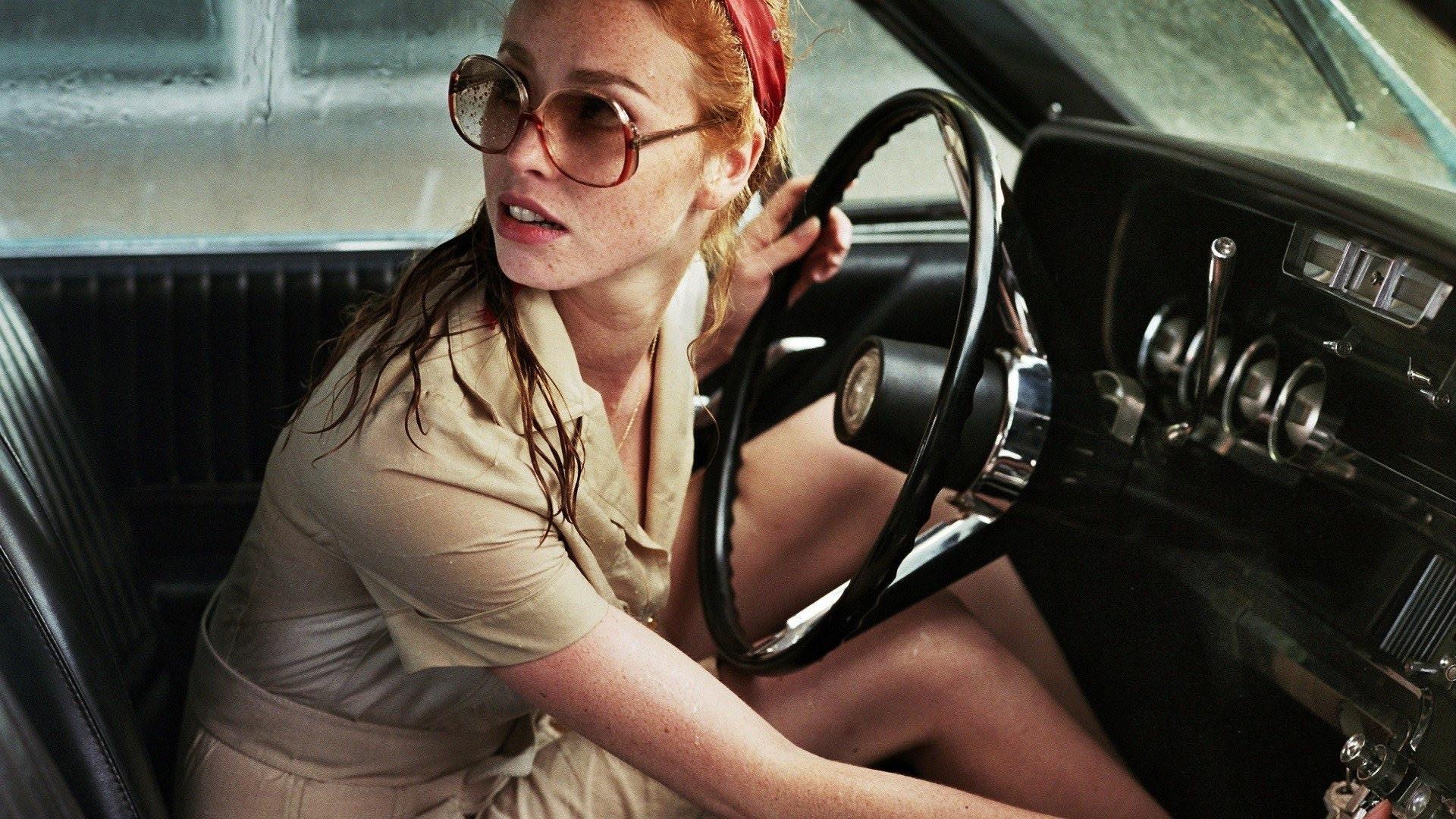 The Lady in the Car with Glasses and a Gun 2015 movie scene