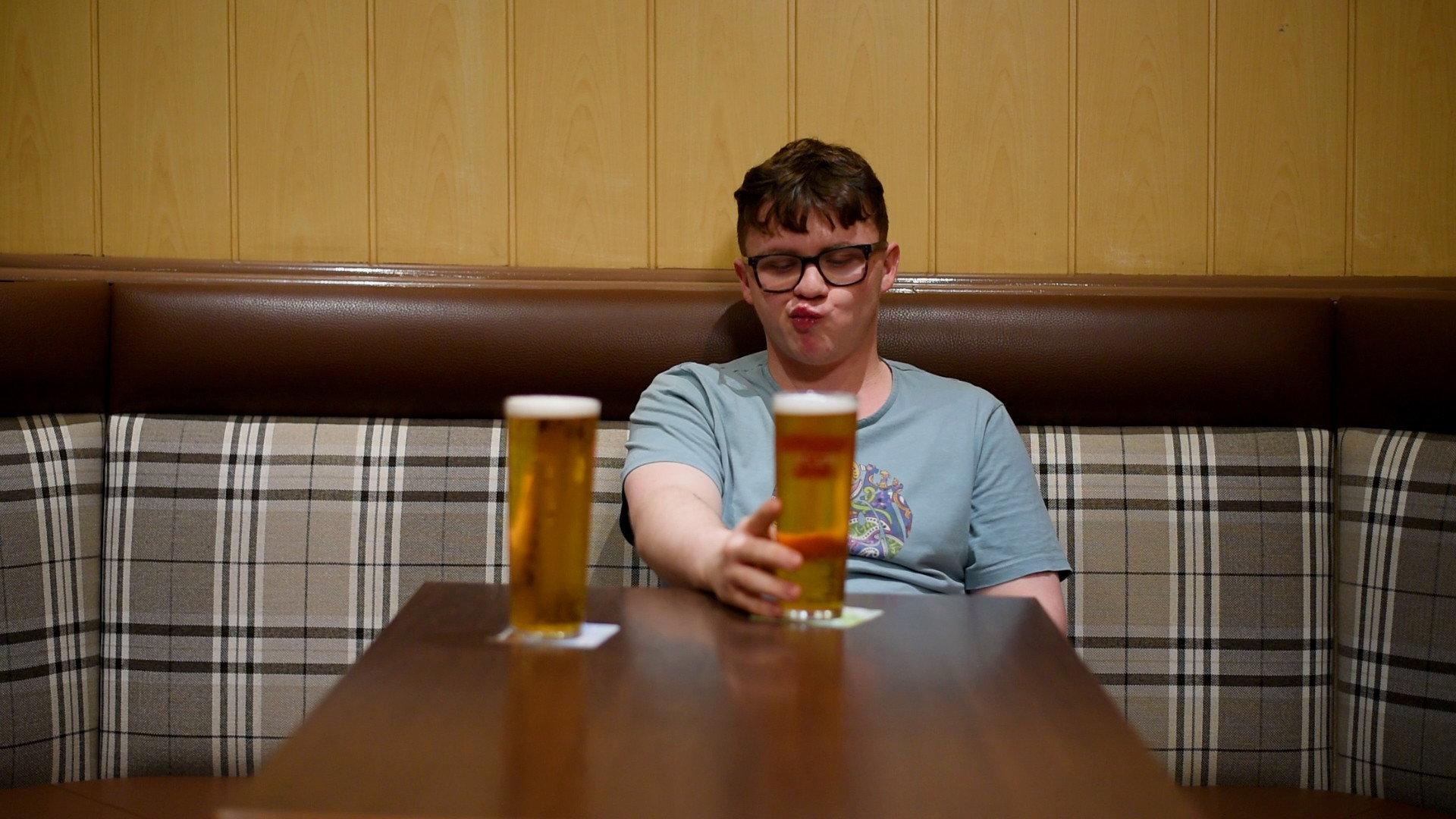 A Drink Between a Father and his Son 2023 movie scene