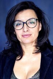 Jacqueline Corado as Maria Ribeiro in Meurtres au Mont-Saint-Michel 2022