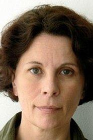 Brigitte Cuvelier as Maklerin in Janine Moves to the Country 2025