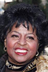 Loretta Long as Susan in Sesame Street: What's the Name of That Song? 2004