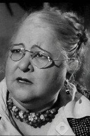 Mimi Aziz as صاحبة البنسيون in Let's Dance 1952