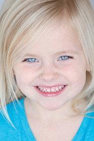 Ella Allan as Lola Loud in A Really Haunted Loud House 2023