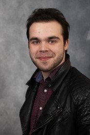 Alex Adam as Connor in Reverie 2025