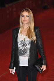 Valentina de Laurentiis as Annunciatrice TV in Christmas in Love 2004