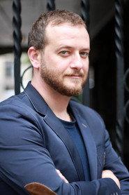 Genti Bejko as Yuri Alekseenko in Lethal Lookalike: The Viktoria Nasyrova Story 2024
