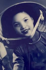 Lê Mai as Vợ Túc sẹo in The Neighbor's Son 1981