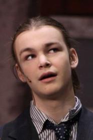Oscar Vebber as The Liaison in The Fall of the Nighthawk 2026