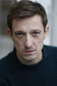 Maxence Dinant as Father Mathieu in A Bookshop in Paris 2021