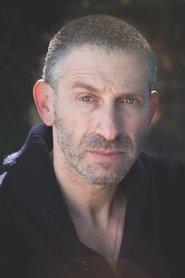 Mark Ivanir as Bruno in Masterplan 2026
