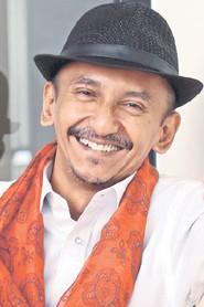 Farouk Hussein as Aniq in Anak Mami The Movie 2002