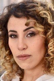 Rym Foglia as Amina Mansouri in High Estate 2024