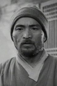 Eok Song as Bar Parton in Ieoh Island 1977