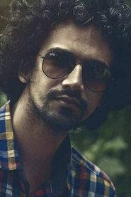 John Joe as Filmmaker 3 in Karma Cafe 2022