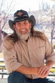 John Potash as Cowboy in A Toy Maker 
