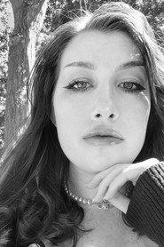 Haylie Blohm as Neya Gleaos in Analog Eyes 2026