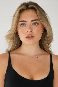 Bella Mraz as Emily in Broomstick Ave 