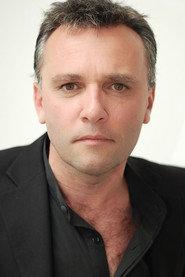 Doug Cooper as Doctor Adelman in The Jonestown Haunting 2020