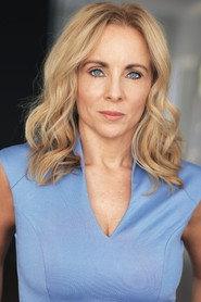 Faith Murphy as Caren Willoughby in Compassionate Caren in the Big Bad World 2022