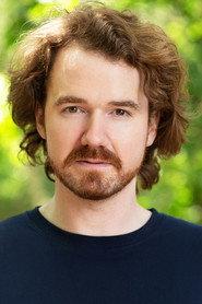 Mike Bodie as Tall Russian Man in London Arabia 2019
