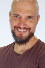Andres Weiss as Immigration Officer in Woman Who Lives at the End of Time 2025