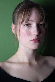 Natalya V. Wood as Young Woman in Room 0 2024