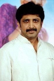 Mohan Raja as Father of the Quadruplets in Enna Satham Indha Neram 2014
