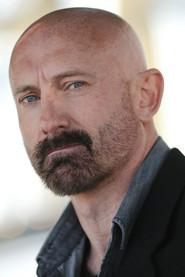 Gareth Watkins as John in Cari 2018