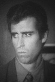 Michael McGaharn as Harry Bates in Blondes Have More Guns 1996