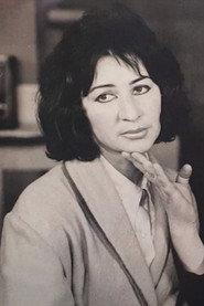 Mimika Luca as Alberi's mother in Rain at the Beach 1984