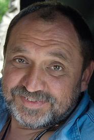 Vladimir Balkashinov as Paul in Report 1995