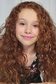 Kaylee Brendle as Young Harlow in Murder Van 