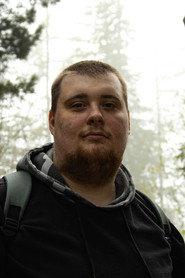 Spencer J. Brown as The Killer in Redacted 2025